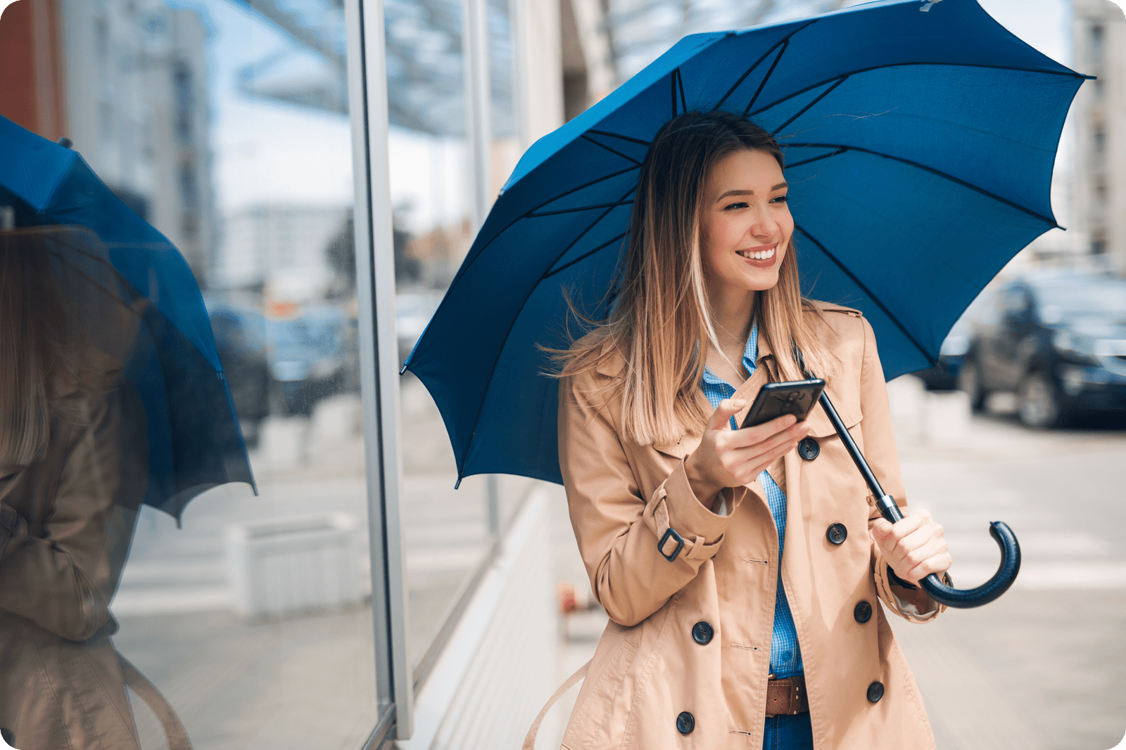 woman with blue umbrella