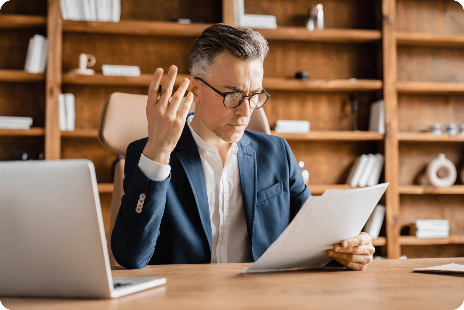 man looking at documents